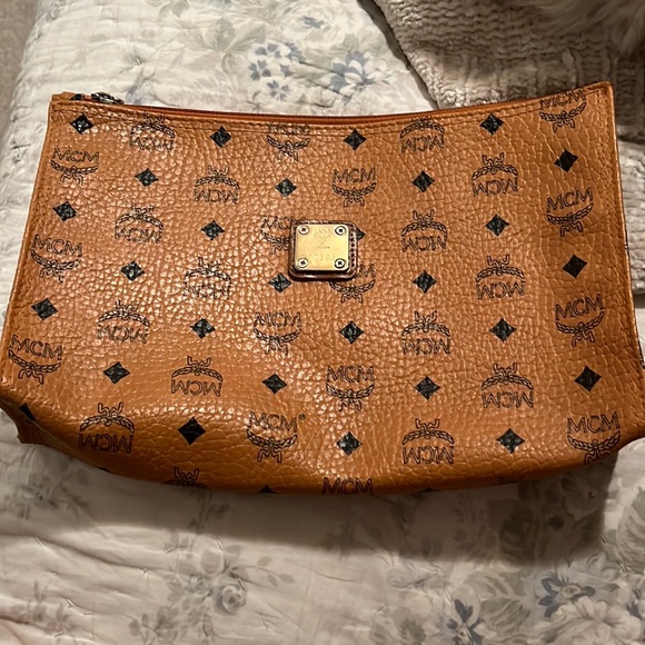 MCM Handbags - Beautiful vintage MCM “look” visetos clutch in great condition with dust bag.